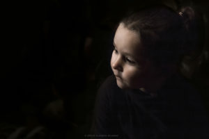 Alessia Scarso photographs Portrait portrait of a little girl with Caravaggesque light